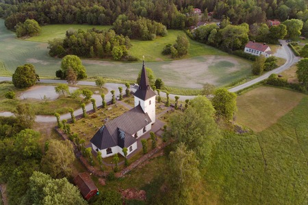Aerial view of the medieval Swedish Overenhorna countryside church located west of Sodertalje.の写真素材