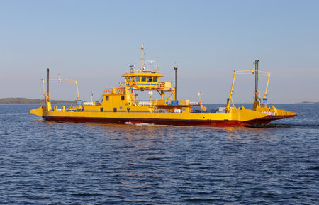 Farosund, Sweden - May 13, 2016: The yellow road ferry Bodilla operated by Trafikverket has departed Farosund with destination Broa in the Swedish province of Gotland.のeditorial素材