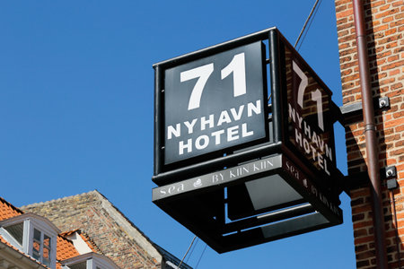 Copenhagen, Denmark - June 27, 2018: Close-up of the Nyhavn hotel 71 sign located in the Nyhavn district in Copenhagen.のeditorial素材