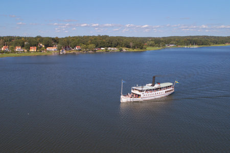 Mariefred, Sweden - July 4, Aerial view of he passenger steam ship Mariefred built 1903, in Lake Malaren arriving the town Mariefredのeditorial素材
