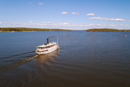 Mariefred, Sweden - July 4, Aerial view of the passenger steam ship Mariefred built 1903, in Lake Malaren departuure from the town Mariefredのeditorial素材
