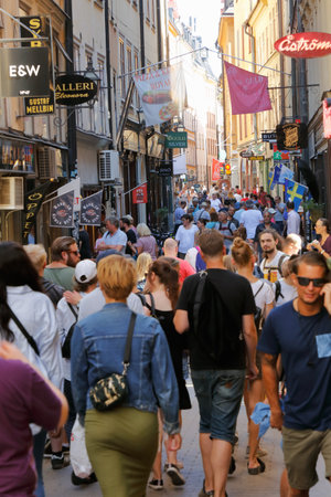 Stockholm, Sweden - July 12, 2018: Crowded street Vasterlangatan in the Old town district.のeditorial素材
