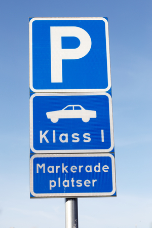 Free of charge car parking area for cars of class 1 only on marked parking lots.の写真素材