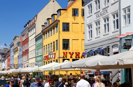 Copenhagen, Denmark - June 27, 2018:  View of the Nyhavn district with restaurants in Copenhagenのeditorial素材