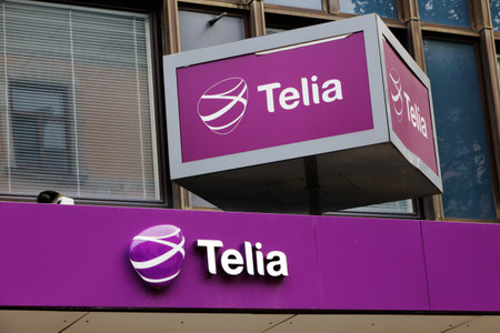 Sundsvall, Sweden - May 30, 2016: The Telia retail shop sign above the entrance to its shop at Storgatan street.のeditorial素材