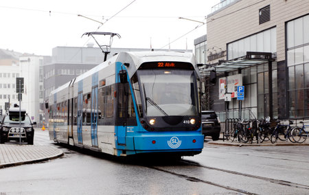 Solna, Sweden - April 7, 2014: Modern tram in the district of Solna business park in service for the Greater Stockholm transportation, SL, Tvarbanan service.のeditorial素材