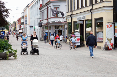 Vaxjo, Sweden - June 26, 2018: People valking the Storgatan pedestrian street in downtown Vaxjo.のeditorial素材