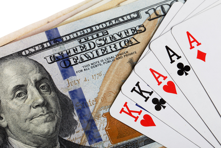 Full house poker hand on US dollar bills.の写真素材