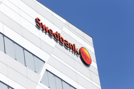 Sundbyberg, Sweden - May 9, 2016: Detail of the Swedbank head office with its logo.のeditorial素材