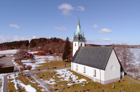 Gnesta, Sweden - March 17, 2018: Aerial view of the Frustuna church.のeditorial素材