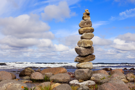 A stone tower at waters edge.の写真素材