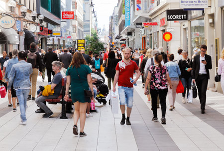 Stockholm, Sweden - June 10, 2019: View of the crowded pedestrian only  Drottningatan street in the downtown district.のeditorial素材
