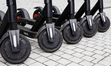 Oslo, Norway - June 20, 2019: A group of parked electric scooters.