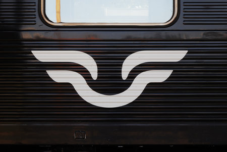 Nykoping, Sweden - August 28, 2019: The railroad company SJ white logo painted on a black passenger coach.のeditorial素材