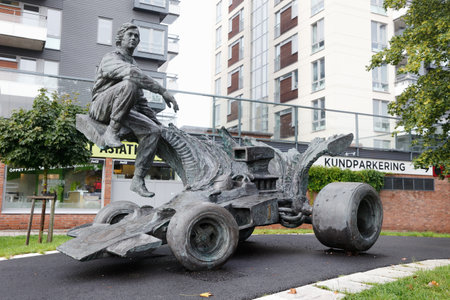 Orebro, Sweden - August 29, 2019: A bronze statue by Richard Brixel of the Formula 1 racing driver  Ronnie Peterson, located in the Almby district.のeditorial素材