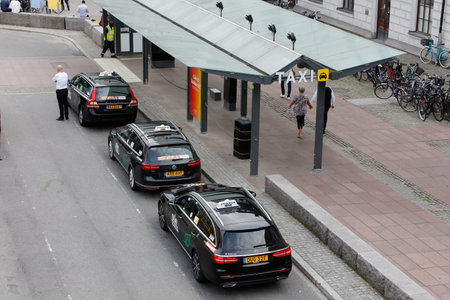 Stockholm, Sweden - September 10, 2019: Taxis waiting for passengers at the taxi stand outside the Stockholm Central station.のeditorial素材