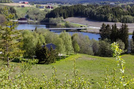 View of the Norwegian river Nidelva with Tanemsbron near Klaebu.の写真素材