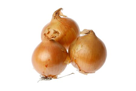 Three common onions isolated on white background.の写真素材