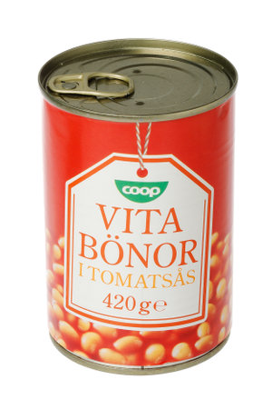 Stockholm, Sweden - November 29, 2019: A tin can of Coop baked beans in tomato sauce for the Swedish market isolated on white background.のeditorial素材
