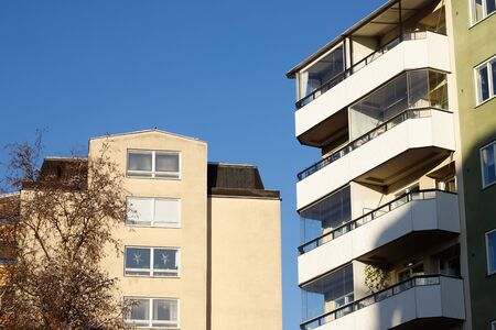 View of two residential multi story buildings constructed during 1950s and 1960s era.の写真素材