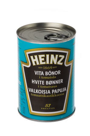 Stockholm, Sweden - February 16, 2020: One tin can of Heinz baked beans with tomato sauce for the Swedish, Danish, Norwegian and Finnish markets isolated on white background.のeditorial素材