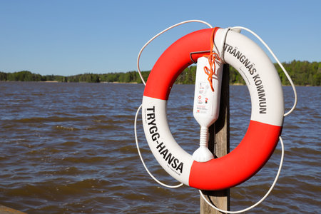 Strangnas, Sweden - May 30, 2019: Lifebuoy donated by the insurance company Trygg-Hansa to Strangnas municipalityのeditorial素材