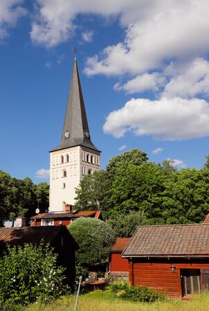 View of the church tower in Swedish town of Norberg.の写真素材
