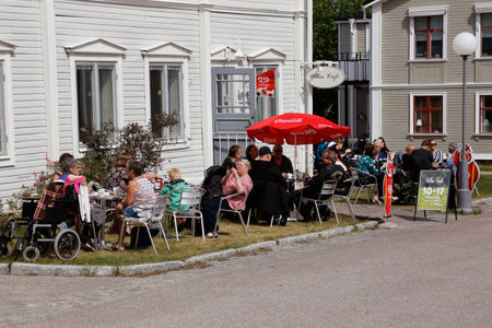 Gammelstad, Sweden - June 16, 2018: Outdoor seating at the Ullas cafe.のeditorial素材
