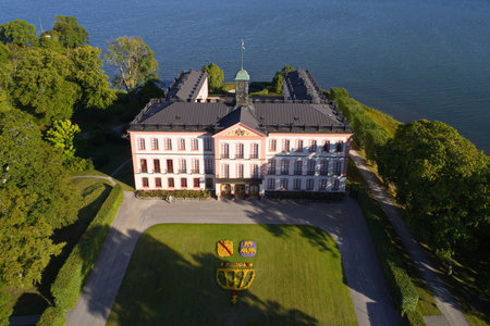 Tullgarn, Sweden - August 10, 2020: Aerial view of the 1800th century Royal Tullgarn castle located in the Swedish province of Sodermanland with a poark open for the public and guided tours inside the building har arranged.のeditorial素材