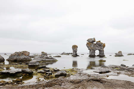 The famous rauk Hunden in a shape of a dog located at the Faro island in the Swedish province of Gotland.の写真素材