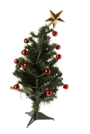 Table top plastic Christmas tree isolated on whieの写真素材