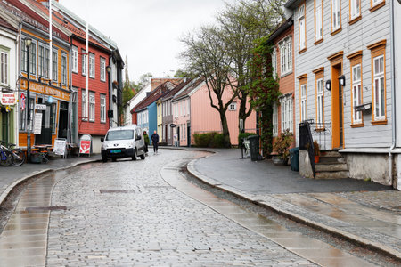 Trondheim, Norway - May 11, 2018: View of the a wet Ovre Bakkelandet street.のeditorial素材
