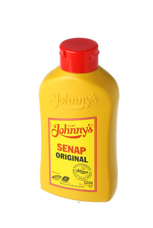 Stockholm, Sweden - February 26, 20221: A plastic package as a bottle with 500 grams of Johnny's original mustard for the Swedish market isolated on a white background.のeditorial素材