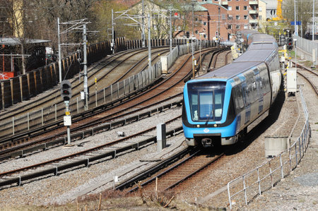 Stockholm, Sweden - April 27, 2021: Stockholm metro train C20 stock inboud to the Globen station.のeditorial素材