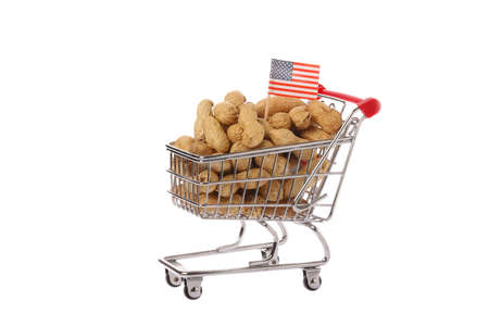 American shopping cart fiiled with peanuts isolated on white background.の写真素材