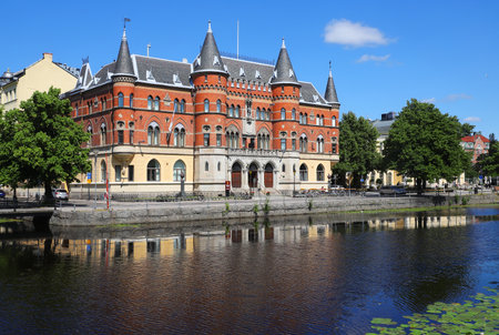 Orebro, Sweden - July 19, 2021: Exterior view of the Clarion Collection Hotel Borgen located at the riverside.のeditorial素材