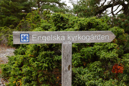 Sign to the English cemetery on Gotland Faro with British sailors buried, who died of cholera in connection with the Crimean War in 1854, where Farosund was a British and French base.の写真素材
