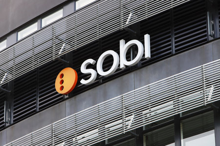 Solna, Swedan - September 2, 2021: Close-up view of the biopharmaceutical company Sobi (Swedish Orphan Biovitrum AB) logo on the head office building.のeditorial素材