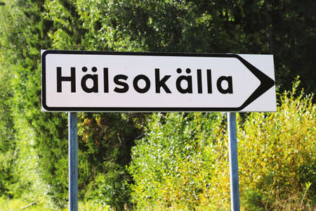 Signpost in the Swedish language for a mineral spring.