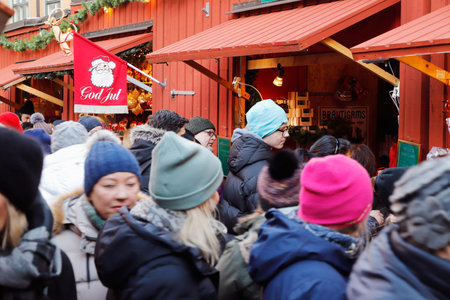Stockholm, Sweden - November 30, 2019: Crowded Christmas market with market stalls at the Stortorget square in Old town district.のeditorial素材
