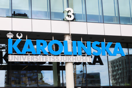 Solna, Sweden - September 2, 2021: The Karolinska University Hospital sign at the new hospistal building.のeditorial素材