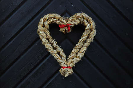Straw heart door decoration.の写真素材