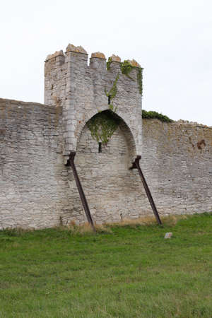 Supporting pillars prottect one of the medieval Visby city wall towers.の写真素材