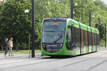 Lund, Sweden - June 15, 2022: Green tram in service for Skanetrafiken on line 1.のeditorial素材