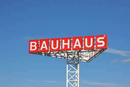 Upplands-Vasby, Sweden - July 2, 2022: Close-up view of the Bauhaus retail home improvement shop logotype on a pole next to the store.のeditorial素材