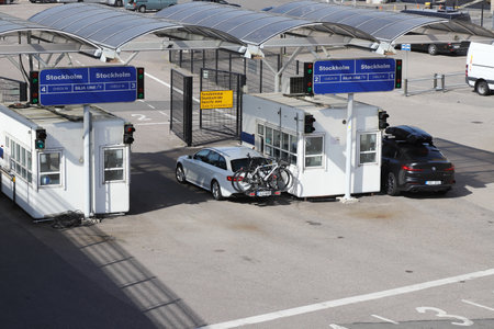 Helsinki, Finland - August 20, 2022: Cars are at the check in gate for the Silja Line ferry to...