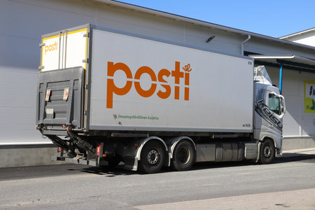 Ylitornio, Finland - August 29, 2022: The Finnish national postal service Posti parcel delivery truck outside the S Market super market.のeditorial素材