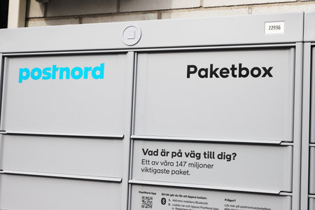 Sodertalje, Sweden - March 11, 2023: Close-up view of rack with  parcel lockers operated by...