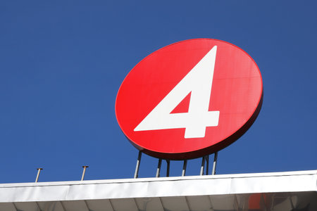 Stockholm, Sweden - August 31, 2023: The Swedish commercial free-to-air network TV channel TV4 logotype at the headquarter and studios  at the Tegeluddsvagen street.のeditorial素材