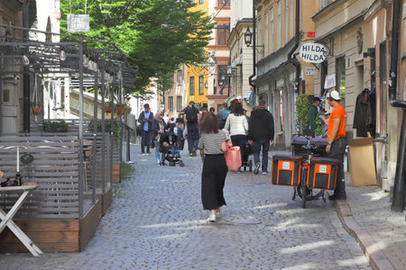 Stockholm, Sweden - August 31, 2023: Street view of the Osterlanggatan street in the Stockholm Old town district.のeditorial素材